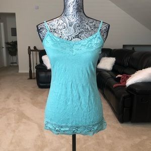 A green/blue tank top.
